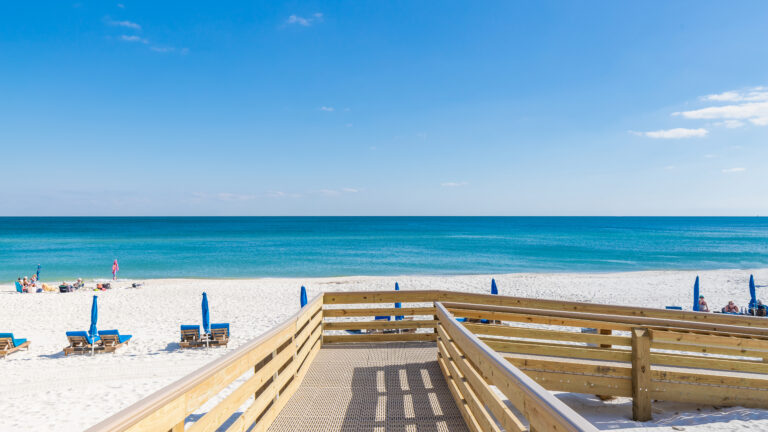 Boardwalk leading to a white-sand Gulf beach